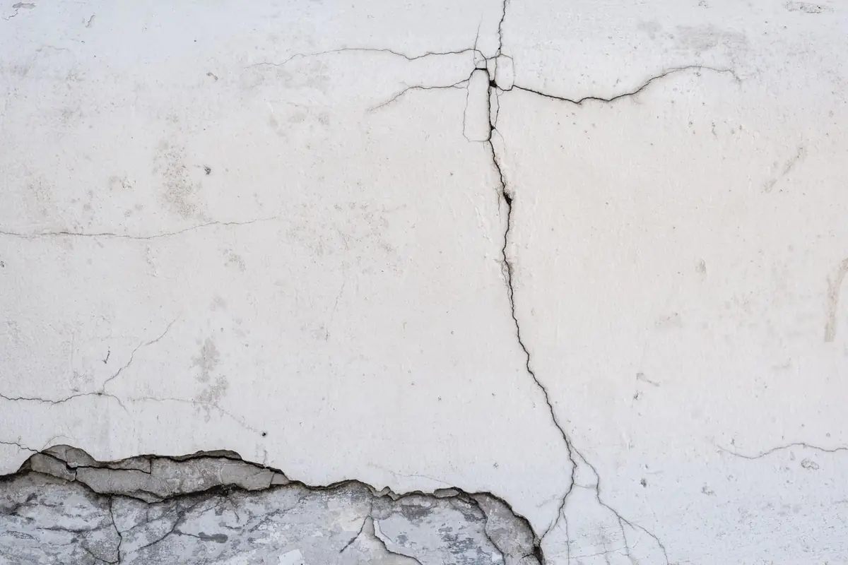 A crack running through a plastered wall